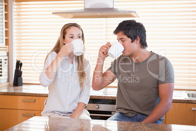 Young couple having a cup of tea