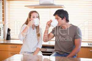 Young couple having a cup of tea
