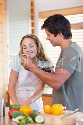 Portrait of a young couple preparing dinner