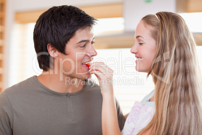 Woman feeding her fiance
