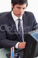 Portrait of a businessman working with a computer