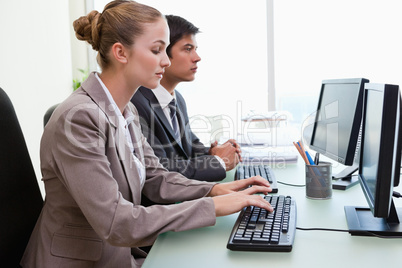 Business people working with computers