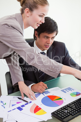 Portrait of a professional business team studying statistics