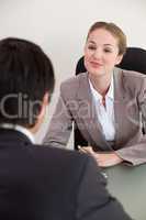 Portrait of a manager interviewing a male applicant