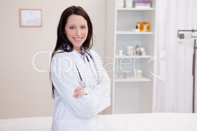 Female doctor with folded arms
