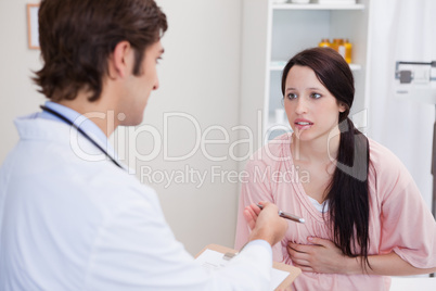 Doctor having serious conversation with patient