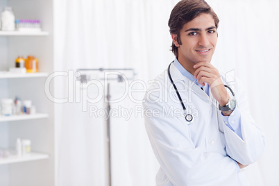 Doctor standing in his examination room