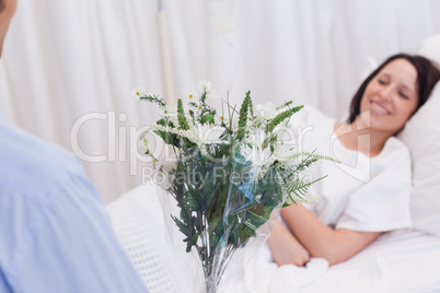 Flowers are brought to patient