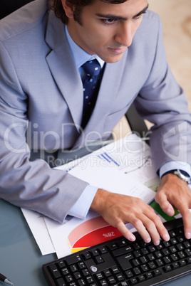 Above view of businessman typing