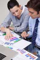 Business team analyzing charts