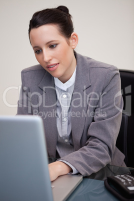 Businesswoman working on her laptop