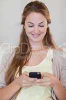 Woman typing a text message
