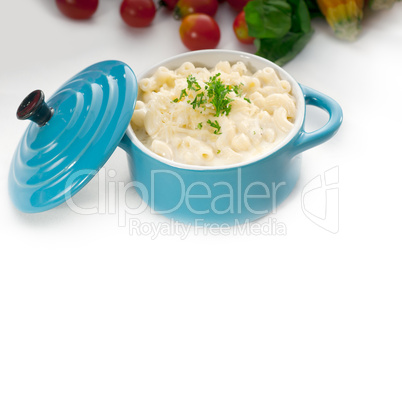 mac and cheese on a blue little clay pot