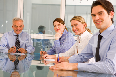 businessmen and businesswomen during a working meeting