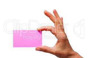 hand holding a pink sheet of paper