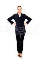 Young businesswoman standing with arms akimbo on white backgroun