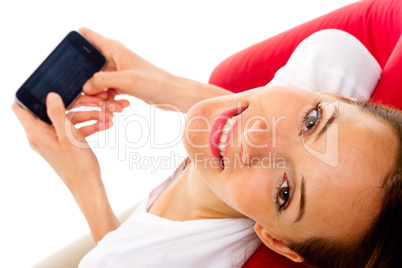 young woman with smart phone on white background studio