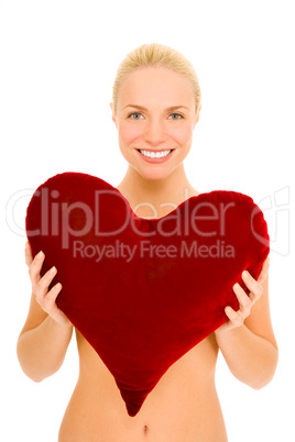 naked woman with heart-shaped pillow