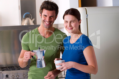 couple having breakfast in the kitchen