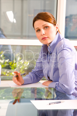 one woman in office at the desk