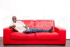 man on the sofa with remote control