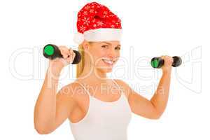 woman with Santa Hat lifts weights