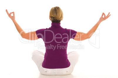 woman practicing yoga