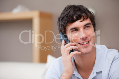 Smiling man on the phone