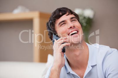 Man on the phone laughing