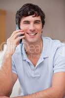 Smiling man on the cellphone