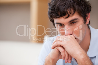 Thoughtful man in the living room