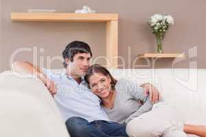 Couple being together on the sofa