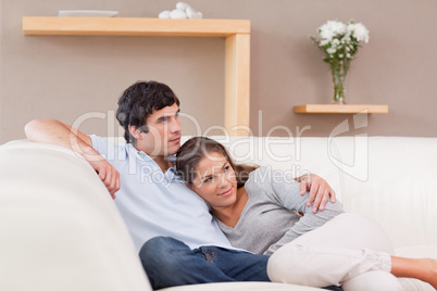 Couple being together on the couch