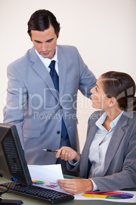 Businessman talking with his secretary