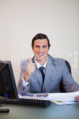 Businessman approving statistics