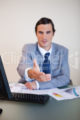 Hand being offered by businessman