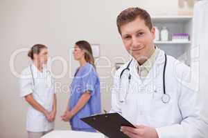 Doctor standing in examination room