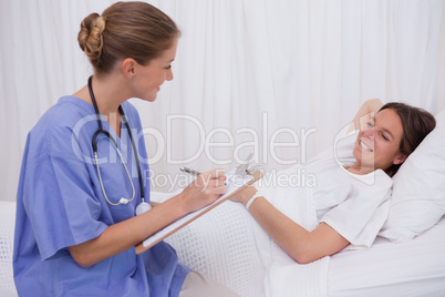 Surgeon talking with patient