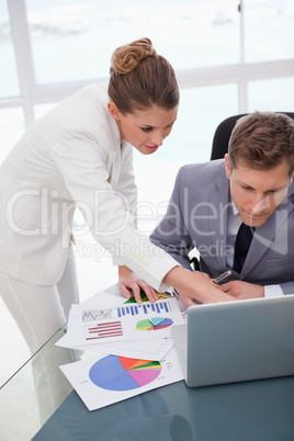 Business team working on survey results