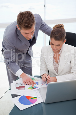 Business team  analyzing survey results