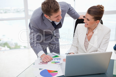 Business team analyzing poll results