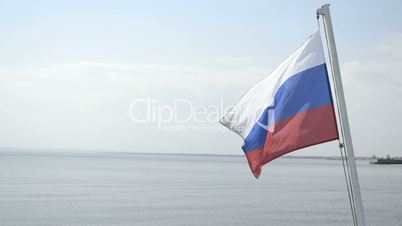 Russian flag flutters on nature