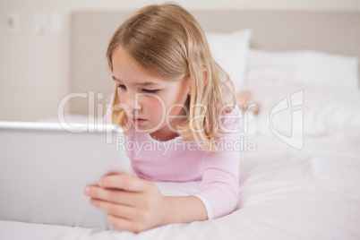 Little girl using a tablet computer