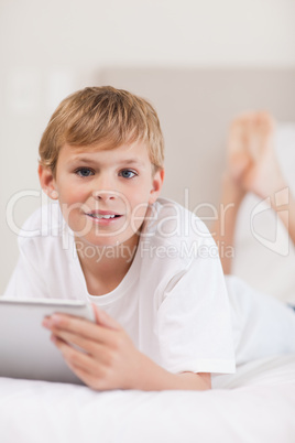 Portrait of a boy using a tablet computer