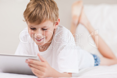 Young boy using a tablet computer