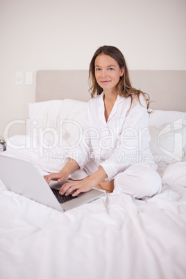 Portrait of a beautiful woman using a laptop