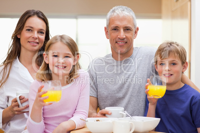 Happy family having breakfast