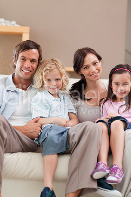 Portrait of a family watching television together