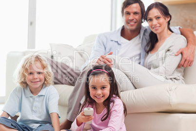 Lovely family watching television