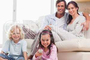 Lovely family watching television
